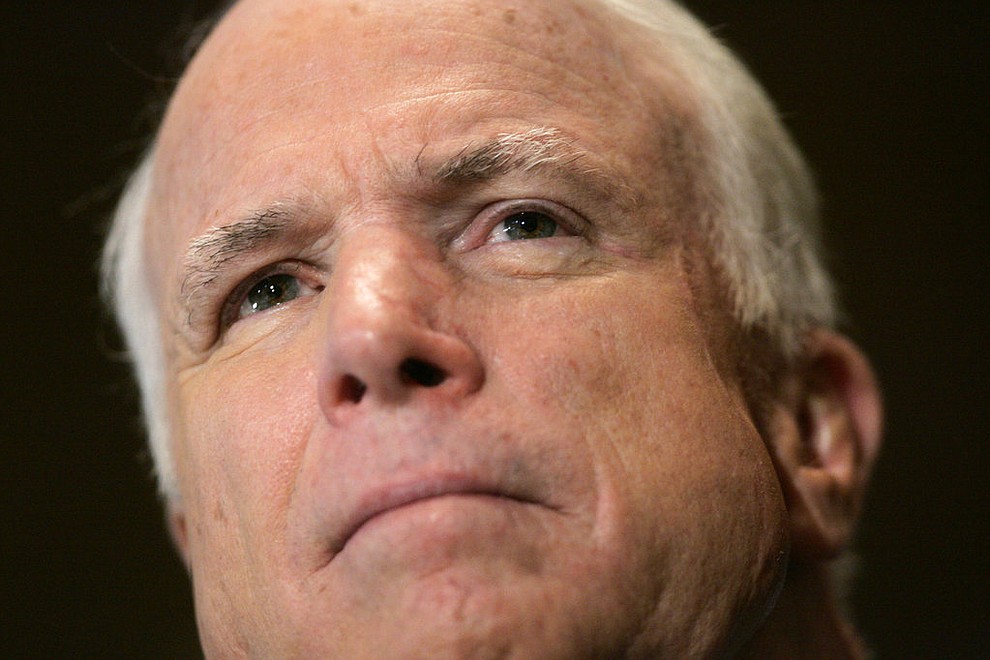 FILE - In this Sept. 27, 2007, file photo, Republican presidential hopeful Arizona Sen. John McCain listens to a question at the Hudson Institute's New York Briefing Council in New York. Aide says senator, war hero and GOP presidential candidate McCain died Saturday, Aug. 25, 2018. He was 81. (AP Photo/Frank Franklin II, File)