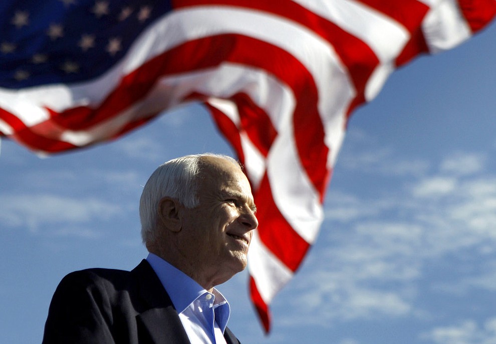 FILE - In this Nov. 3, 2008, file photo, Republican presidential candidate Sen. John McCain, R-Ariz., speaks at a rally in Tampa, Fla. Aide says senator, war hero and GOP presidential candidate McCain died Saturday, Aug. 25, 2018. He was 81. (AP Photo/Carolyn Kaster, File)