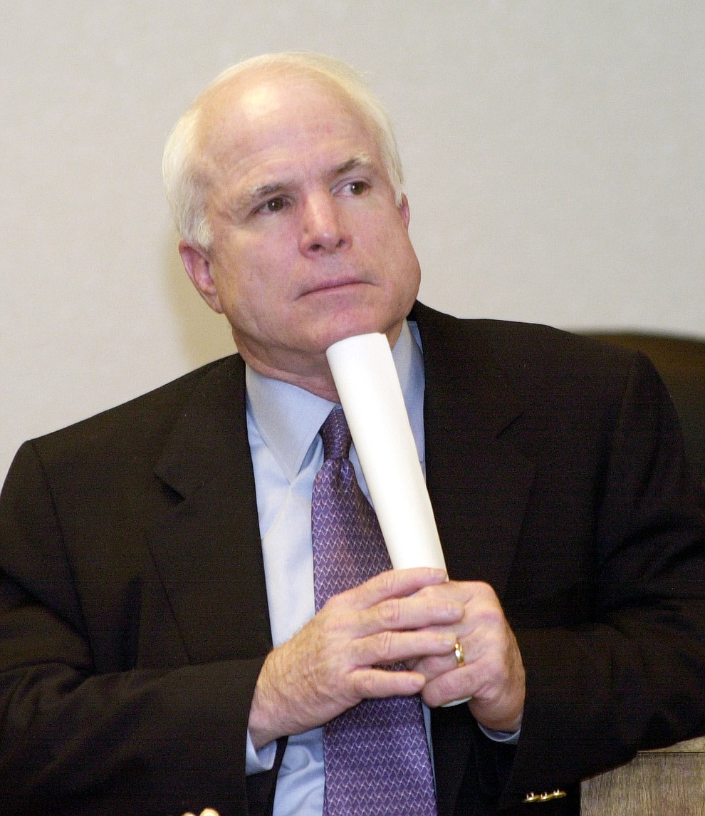 Senator John McCain listens Monday at a meeting of concerned citizens at the Yavapai County Administration Building. McCain listened as issues regarding land swap, water and the pine bark beetle issue were primary issues of discussion. (Jo. L. Keener/The Daily Courier)