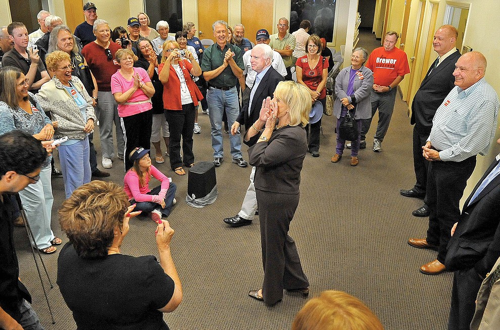 Prescott 10-08-10.Matt Hinshaw/The Daily Courier.Senator John McCain and Governor Jan Brewer talk to thr crowd about how important the upcoming election is Friday afternoon during an informal meet and greet in Prescott.