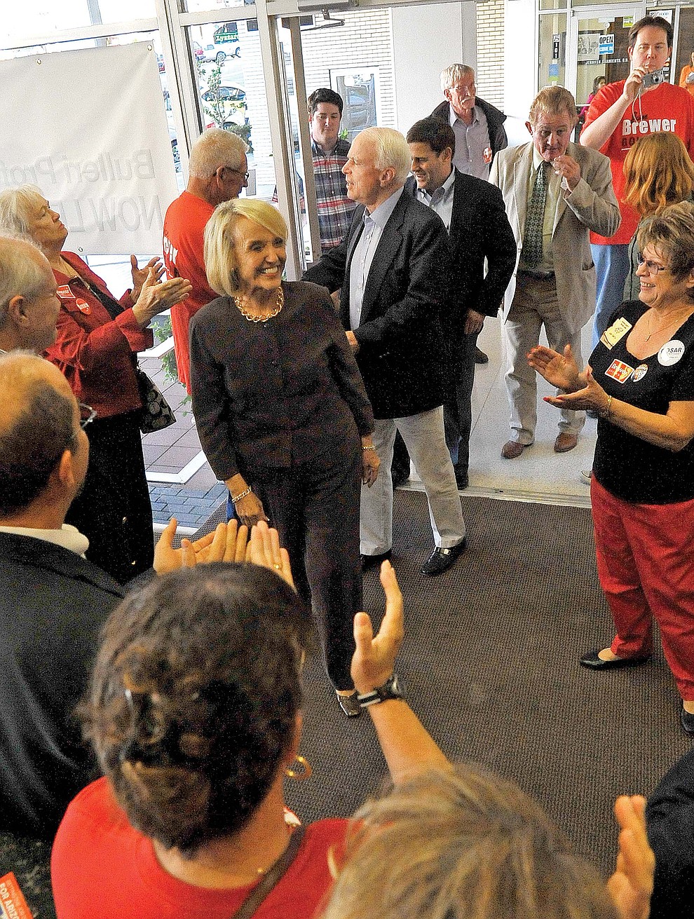 Prescott 10-08-10.Matt Hinshaw/The Daily Courier.Senator John McCain and Governor Jan Brewer make their way through the crowd Friday afternoon for an informal meet and greet in Prescott.