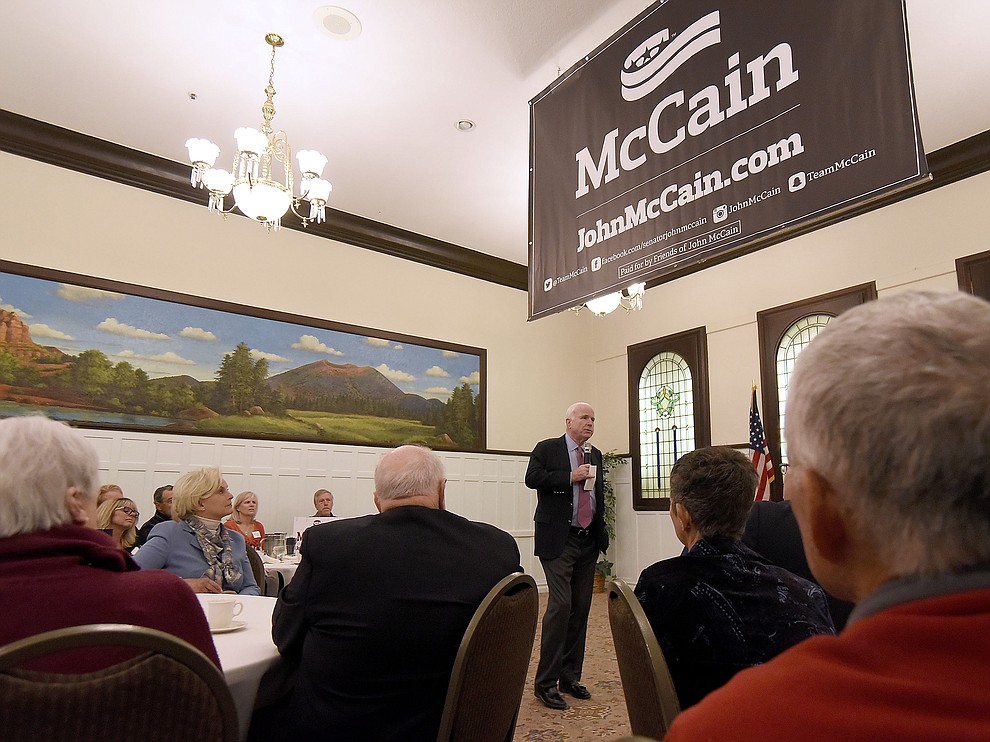Sen. John McCain talks to a room full of people while his wife Cindy looks on Tuesday morning March 29, 2016 at the Hassayampa Inn while hosting a coffee reception in Prescott. (Matt Hinshaw/The Daily Courier)