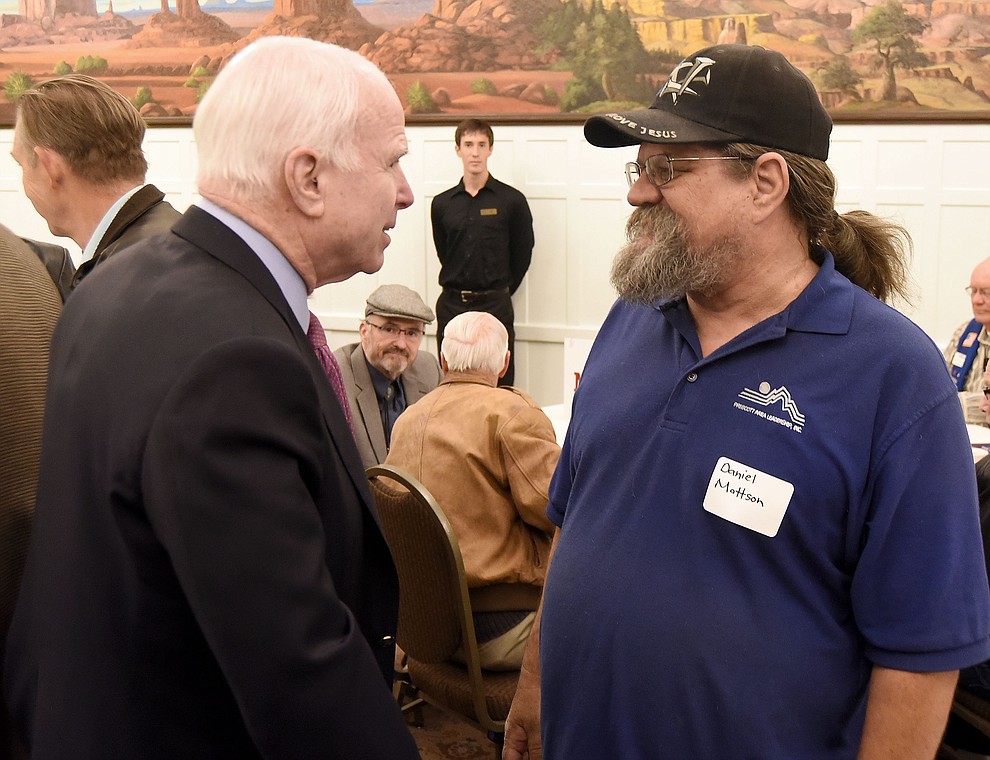 Sen. John McCain chats with Danny Mattson Tuesday morning March 29, 2016 at the Hassayampa Inn while hosting a coffee reception in Prescott. (Matt Hinshaw/The Daily Courier)
