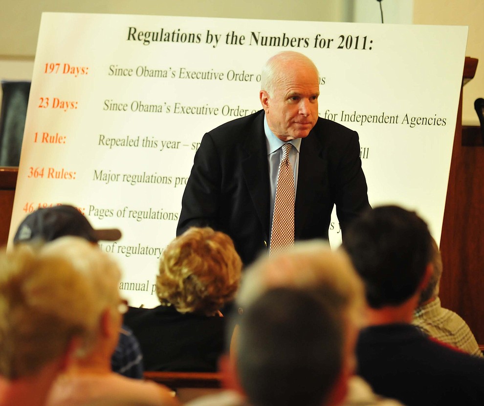 Prescott -August 22, 2011.Les Stukenberg/The Daily Courier.United States Senator John McCain listens to a question from an audience member during a Town Hall event Monday at the First Congregational Church in Prescott.