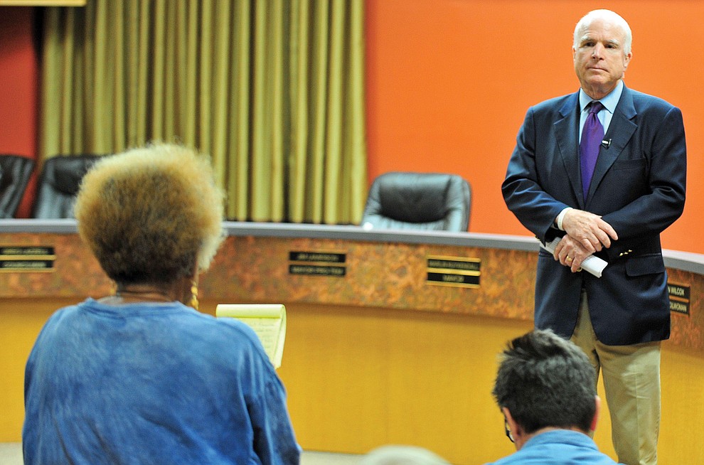 Prescott 08-29-14.Matt Hinshaw/The Daily Courier.Senator John McCain listens to Zena Mitchell ask a question duing a town hall meeting Friday afternoon at the Prescott City Council Chambers. Friday also happened to be McCain's 78th birthday.