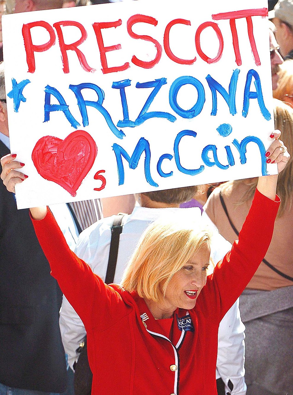 Prescott -- 04-04-08.The Daily Courier/Matt Hinshaw.A John McCain, supporter holds up a large sign while waiting for McCain to speak in front of the Yavapai County Courthouse Saturday morning in Prescott.