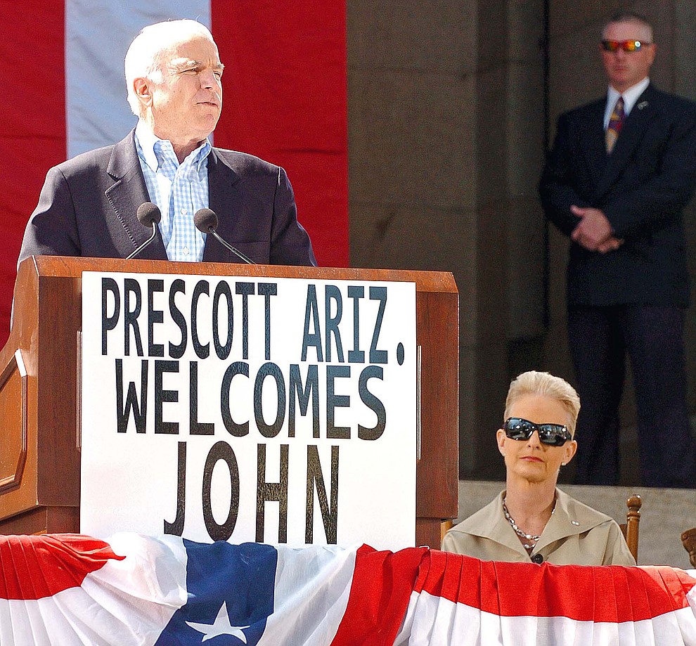 Prescott -- 04-04-08.The Daily Courier/Matt Hinshaw.Cindy McCain listens as her husband and Republican presidential candidate Senator John McCain, speaks in front of the Yavapai County Courthouse Saturday morning in Prescott.