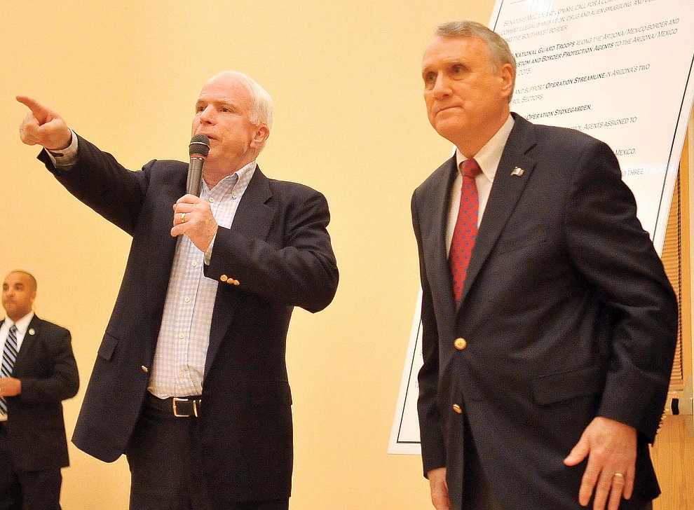 Prescott 07-24-10.Matt Hinshaw/The Daily Courier.U.S. Senators, R-Arizona, John McCain, left, and Jon Kyl take turns answering questions from the crowd during a town hall style meeting at the Adult Center of Prescott Saturday afternoon.