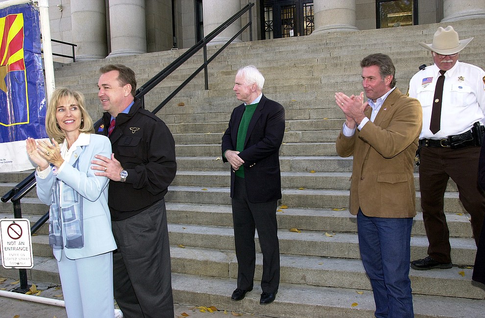 Courier/Jo. L. Keener.Nancy and Matt Salmon at left, Senator John McCain, and Republican candidate Rick Renzi on the court house steps during a Republican rally Monday.