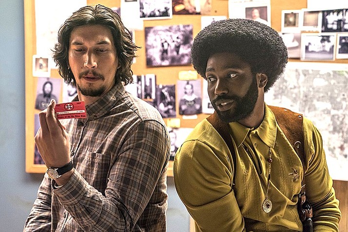 BLACKkKLANSMAN stars John David Washington, who portrays Ron Stallworth, a young, educated black man who wanted to be a law enforcement officer. He was the first black man hired by the Colorado Springs city police department.
