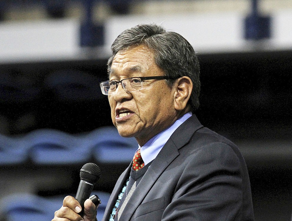 FILE - In this May 12, 2015, file photo, Navajo Nation President Russell Begaye gives his inaugural speech at Fighting Scouts Events Center in Fort Defiance, Ariz. Navajo voters have a record number of candidates to choose from in the Tuesday, Aug. 28, 2018 presidential primary election. The race has drawn 18 candidates with the top two vote-getters moving on to the November general election. (Alexa Rogals/The Daily Times via AP, file)