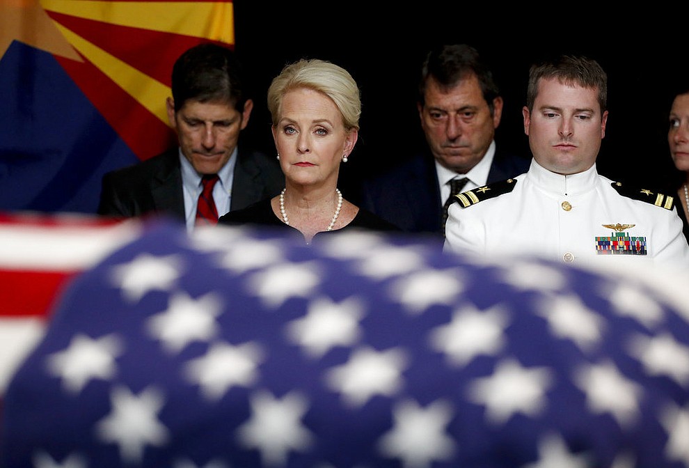 Cindy McCain, wife of Sen. John McCain, R-Ariz. sits with her son Jack during a memorial service at the Arizona Capitol on Wednesday, Aug. 29, 2018, in Phoenix. (AP Photo/Jae C. Hong, Pool)