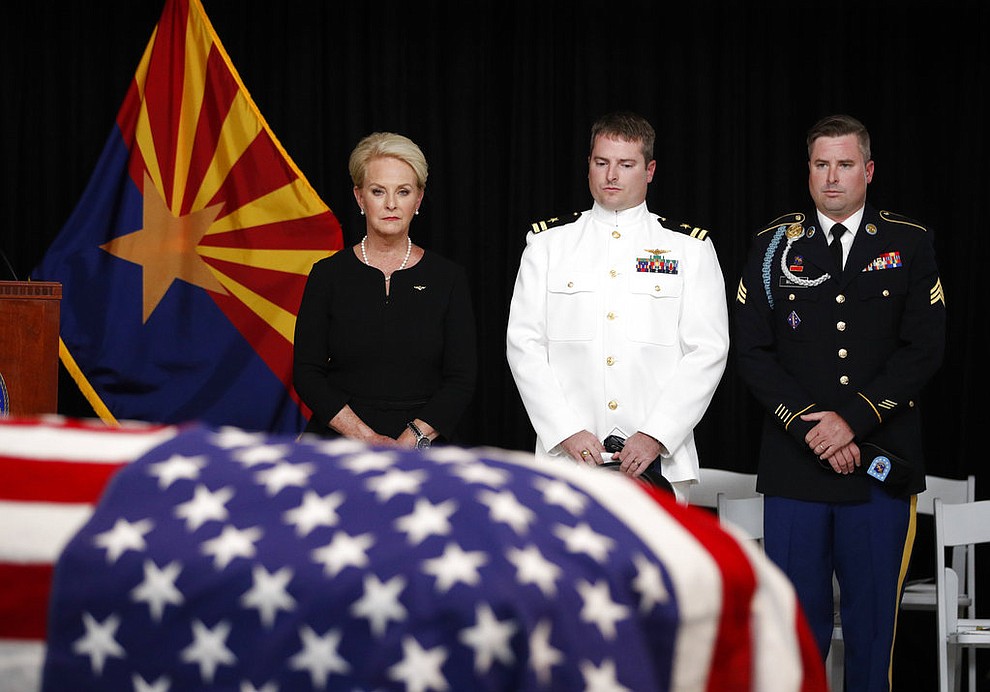Cindy McCain, wife of Sen. John McCain, R-Ariz. stands with her sons Jack and Jimmy, right, during a memorial service at the Arizona Capitol on Wednesday, Aug. 29, 2018, in Phoenix. (AP Photo/Jae C. Hong, Pool)