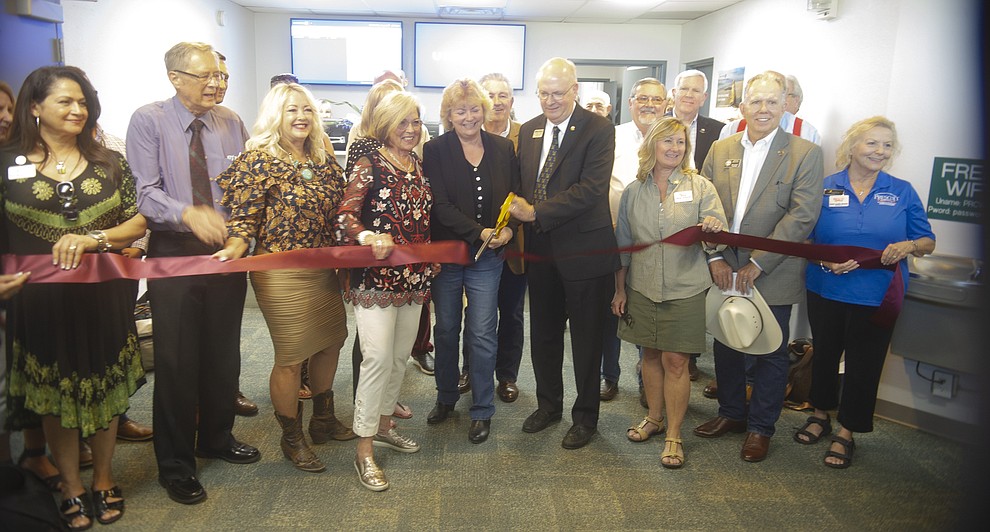 Dignitaries cut the ribbon as United Express officially opened for business at the Prescott Regional Airport  Wednesday, August 29, 2018. (Les Stukenberg/Courier)
