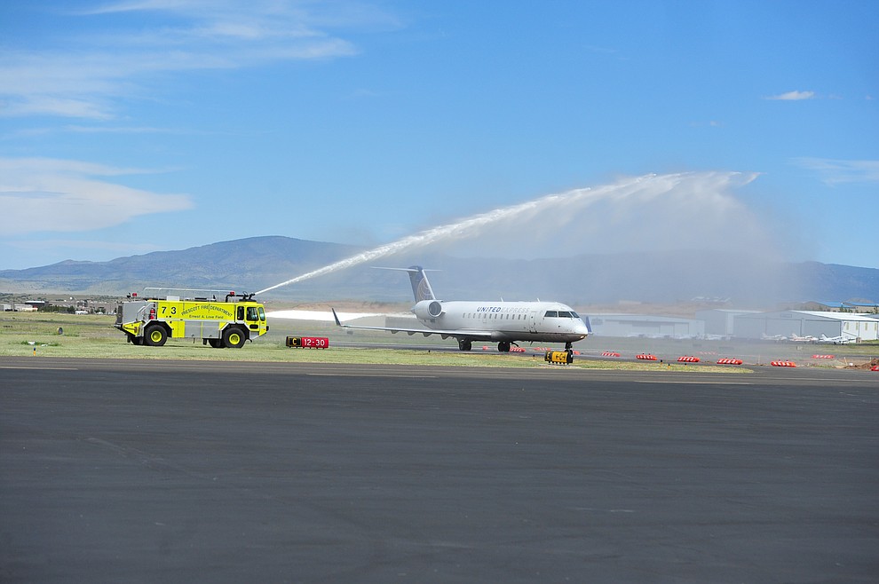 The first Skywest jet lands as United Express officially opened for business at the Prescott Regional Airport  Wednesday, August 29, 2018. (Les Stukenberg/Courier)
