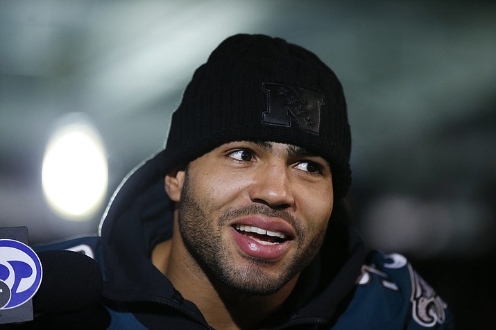 Then-Philadelphia Eagles linebacker Mychal Kendricks answers questions during a press conference at the Mall of America in Bloomington, Minn., Thursday, Feb. 1, 2018. Federal prosecutors in Philadelphia say Cleveland Browns linebacker Mychal Kendricks used insider trading tips from an acquaintance to make about $1.2 million in illegal profits on four major trading deals. Kendricks says in a statement released by his lawyer Wednesday, Aug. 29, 2018, that he’s sorry and “deeply” regrets his actions. (Yong Kim/The Philadelphia Inquirer via AP)