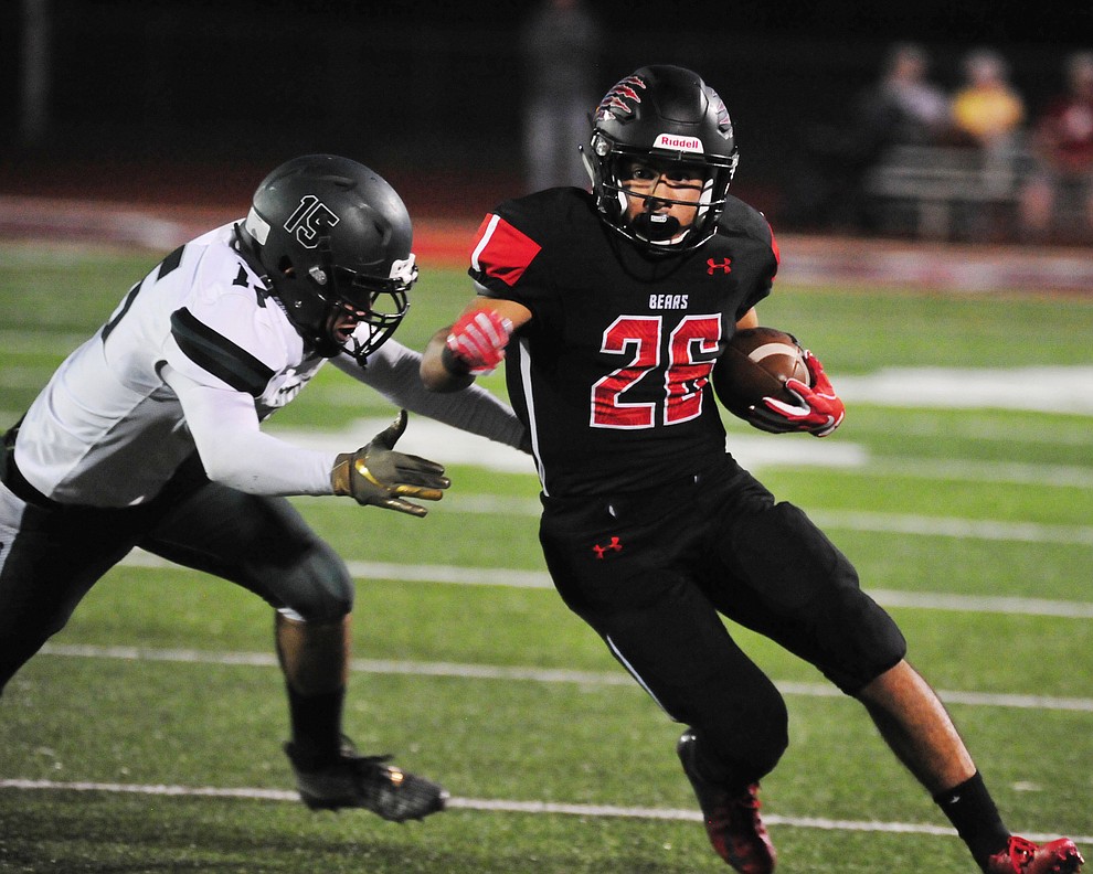 Bradshaw Mountain's Anthony Mata (26) runs to the sideline and a big gain as the Bears take on the Youngker Roughriders in their home opener Friday, August 31, 2018 in Prescott Valley. (Les Stukenberg/Courier)