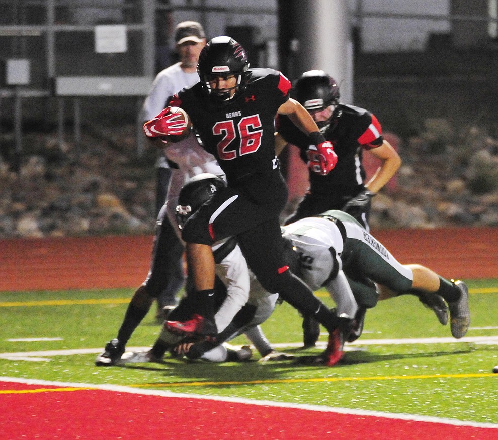 Bradshaw Mountain's Anthony Mata (26) hits the end zone for a score as the Bears take on the Youngker Roughriders in their home opener Friday, August 31, 2018 in Prescott Valley. (Les Stukenberg/Courier)