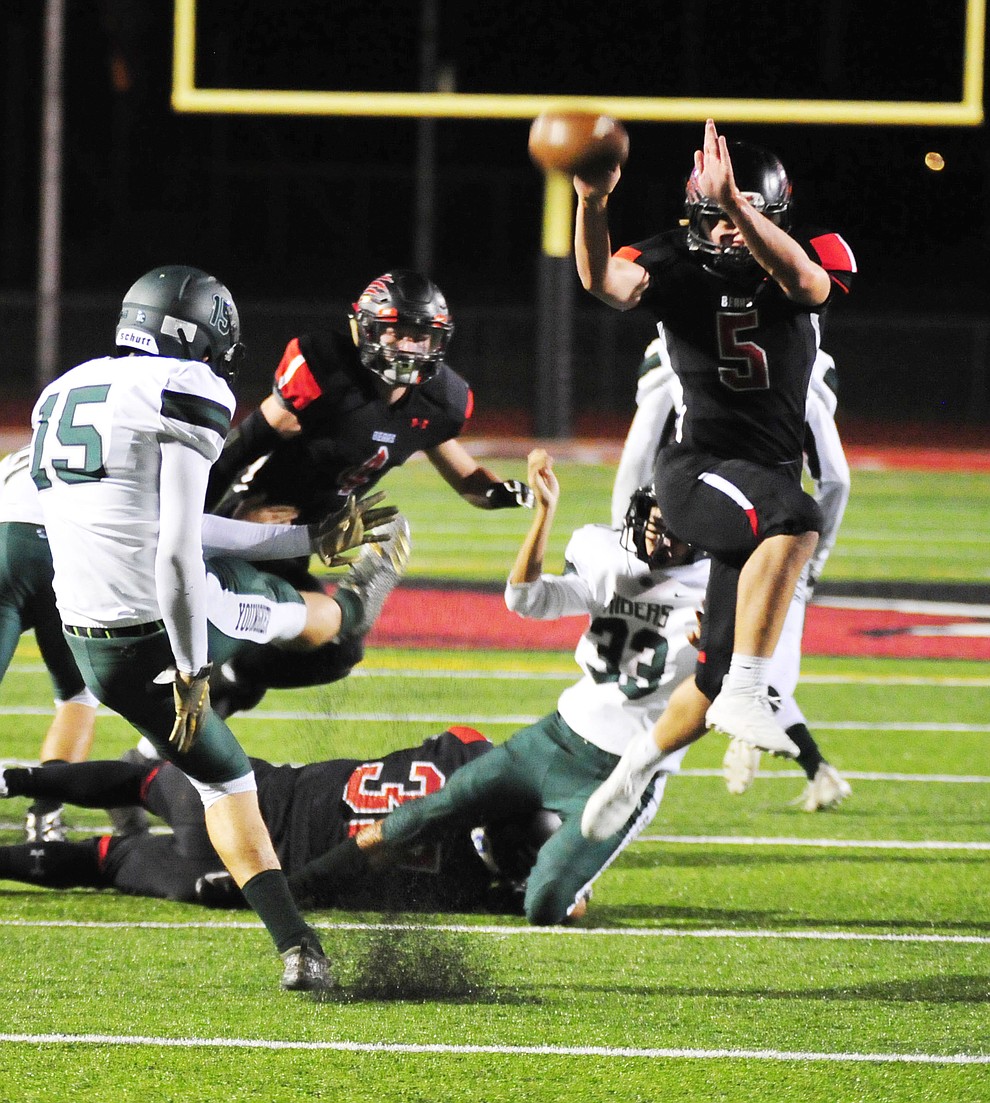 Bradshaw Mountain's Logan Brannan (5) blocks the punt as the Bears take on the Youngker Roughriders in their home opener Friday, August 31, 2018 in Prescott Valley. (Les Stukenberg/Courier)
