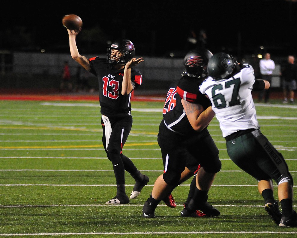 Bradshaw Mountain's Austin Gonzales throws as the Bears take on the Youngker Roughriders in their home opener Friday, August 31, 2018 in Prescott Valley. (Les Stukenberg/Courier)