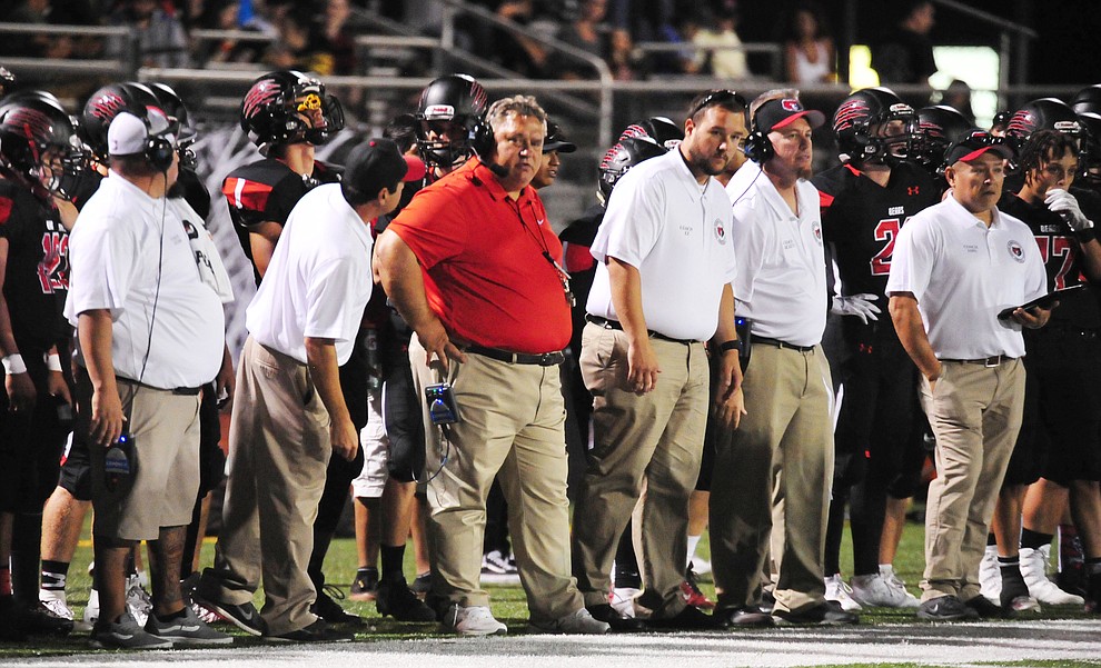 Bradshaw Mountain Head Coach Chuck Moeller and his coaching staff on the sideline as the Bears take on the Youngker Roughriders in their home opener Friday, August 31, 2018 in Prescott Valley. (Les Stukenberg/Courier)