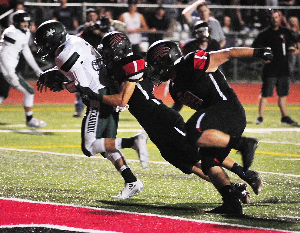 Bradshaw Mountain's Mason Stults (88) gets the sack near the end zone as the Bears take on the Youngker Roughriders in their home opener Friday, August 31, 2018 in Prescott Valley. (Les Stukenberg/Courier)