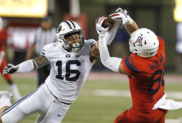 BYU linebacker Sione Takitaki (16) breaks up a pass intended for Arizona tight end Bryce Wolma (81) during the first half of an NCAA college football game Saturday, Sept. 1, 2018, in Tucson, Ariz. (Rick Scuteri/AP)

