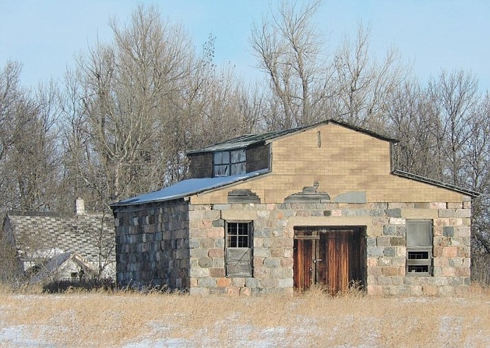 This undated photo shows the old jail at the center of Ruso, N.D. North Dakota’s smallest incorporated city is rebounding after the death of its longtime mayor. On the verge of collapse, the McLean County community of Ruso now expects to soon experience a doubling of its population, from two residents to four. (Kim Fundingsland/Minot Daily News via AP)

