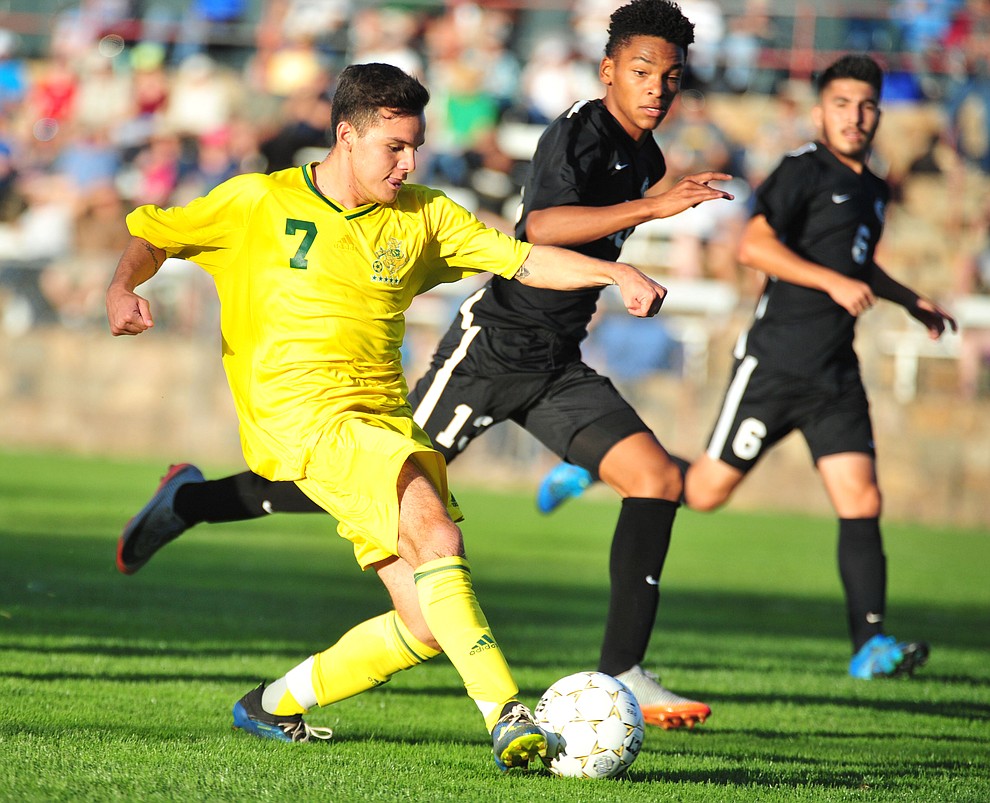 Yavapai's Esteban Franco sends a shot on goal as the Roughriders take on Chandler/Gilbert in their home opener Saturday Sept. 1, 2018 in Prescott. (Les Stukenberg/Courier)