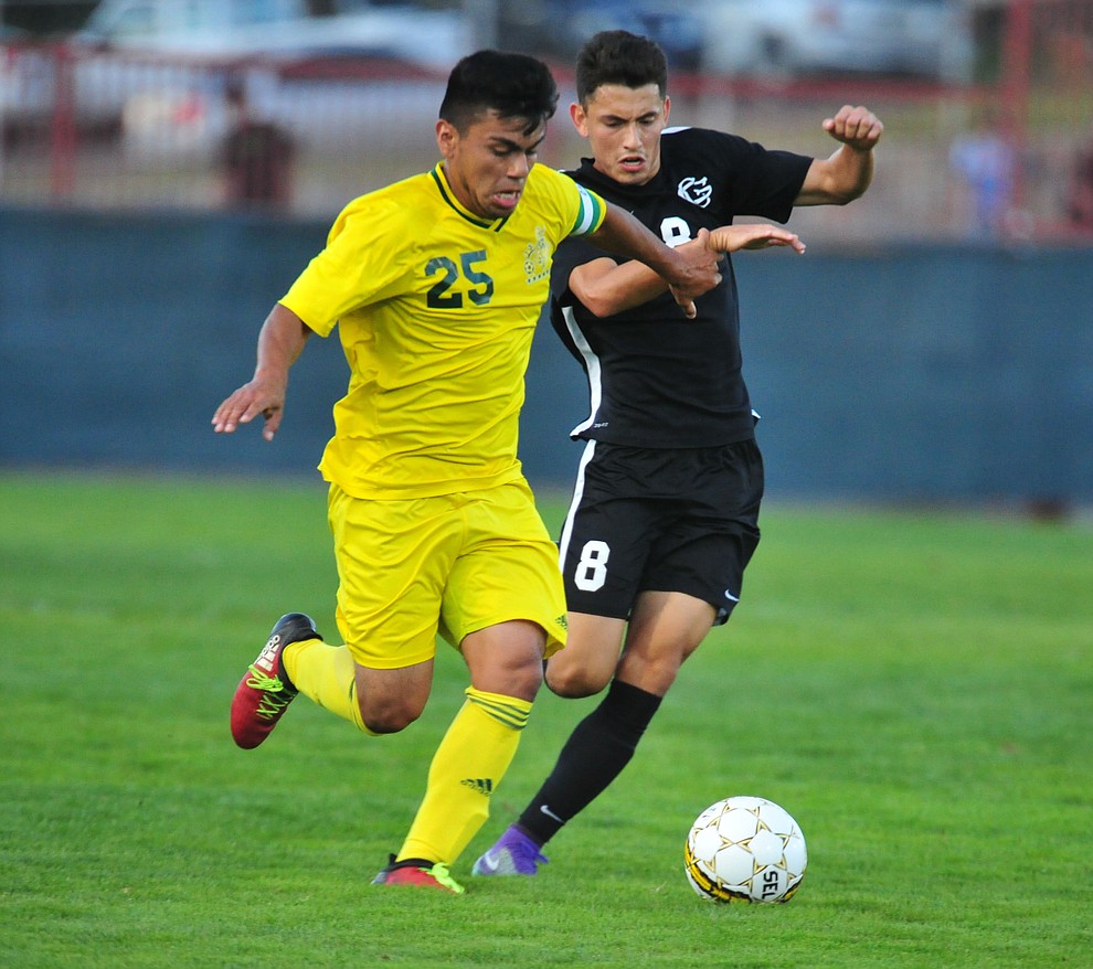 Yavapai's Jose Perez Flores battles for the ball as the Roughriders take on Chandler/Gilbert in their home opener Saturday Sept. 1, 2018 in Prescott. (Les Stukenberg/Courier)