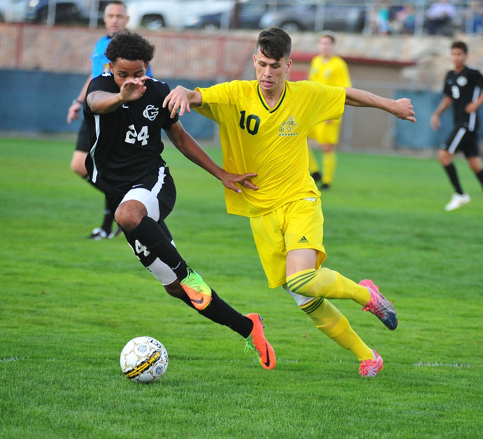 Yavapai's Daniel Mulholland tries to recapture the ball as the Roughriders take on Chandler/Gilbert in their home opener Saturday Sept. 1, 2018 in Prescott. (Les Stukenberg/Courier)