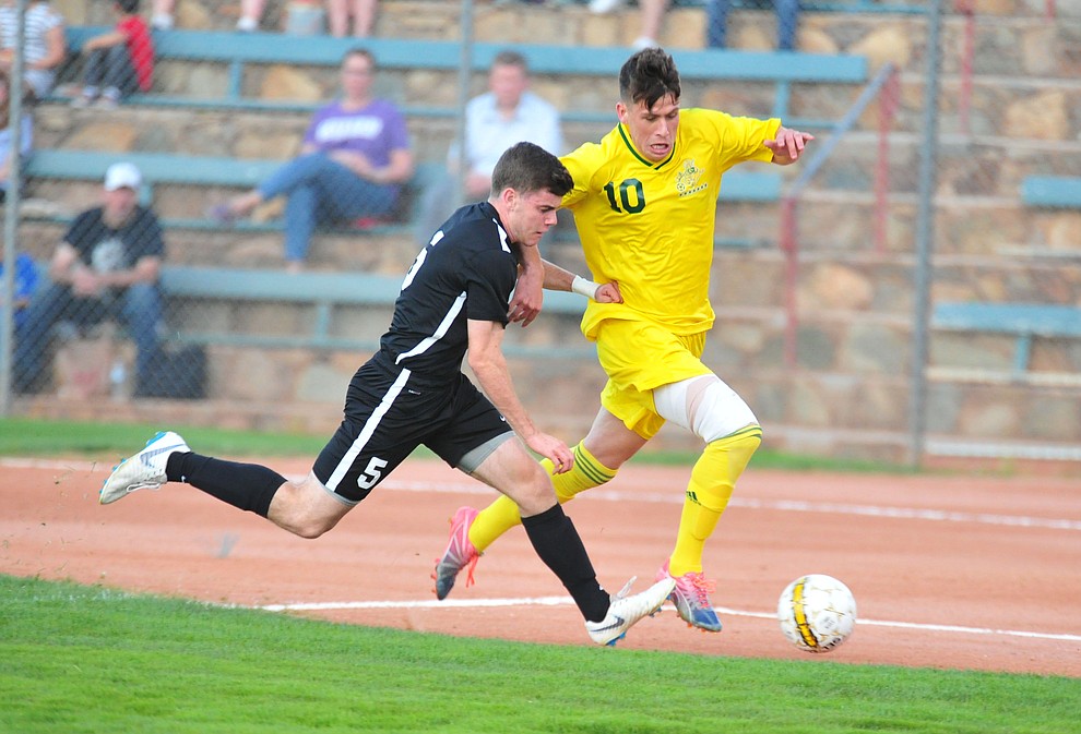 Yavapai's Daniel Mulholland heads for a shot on goal as the Roughriders take on Chandler/Gilbert in their home opener Saturday Sept. 1, 2018 in Prescott. (Les Stukenberg/Courier)
