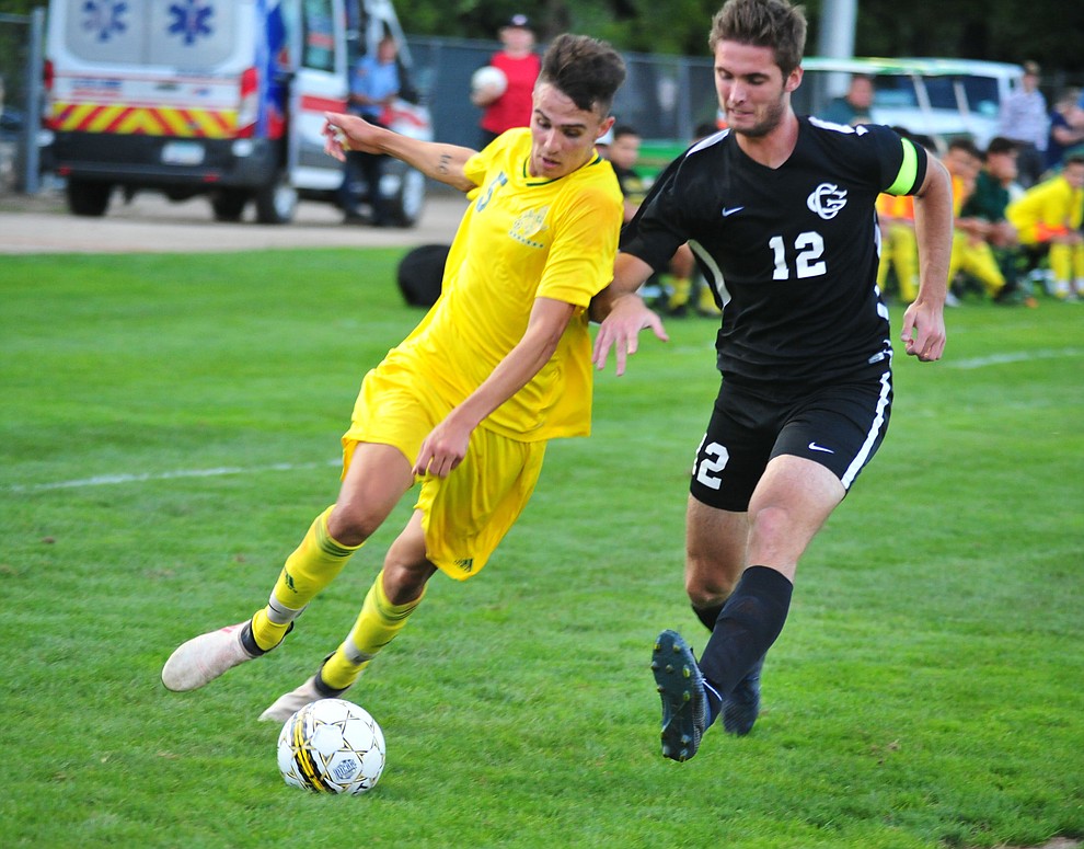 Yavapai's Gabriel Claudio drives into the box as the Roughriders take on Chandler/Gilbert in their home opener Saturday Sept. 1, 2018 in Prescott. (Les Stukenberg/Courier)