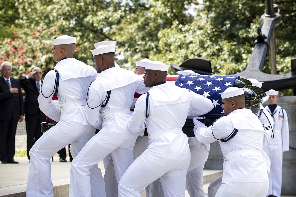 U.S. Navy Body Bearers move the casket of Sen. John McCain from his processional hearse into the United States Naval Academy Chapel on Sept. 2, 2018. (Mass Communication Specialist 2nd Class Nathan Burke/U.S. Navy via AP)
