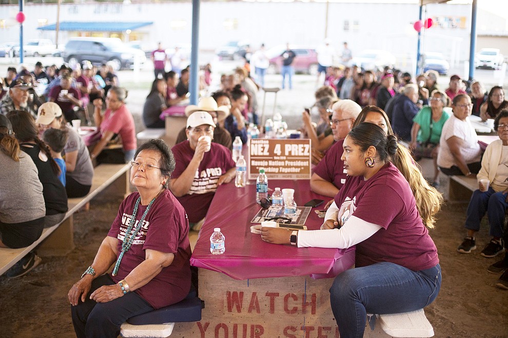 Supporters of Navajo Nation presidential candidate Jonathan Nez gather at the fairgrounds in the tribal capital of Window Rock, Ariz., to listen to the results of the election Tuesday, Aug. 28, 2018. The presidential field includes seasoned politicians who tout experience and newcomers who are challenging the status quo. (AP Photo/Cayla Nimmo)