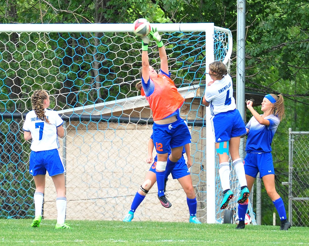 Chino Valley's Kacey Matthews makes a save as the Cougars take on Snowflake at home Tuesday Sept. 4, 2018. (Les Stukenberg/Courier)