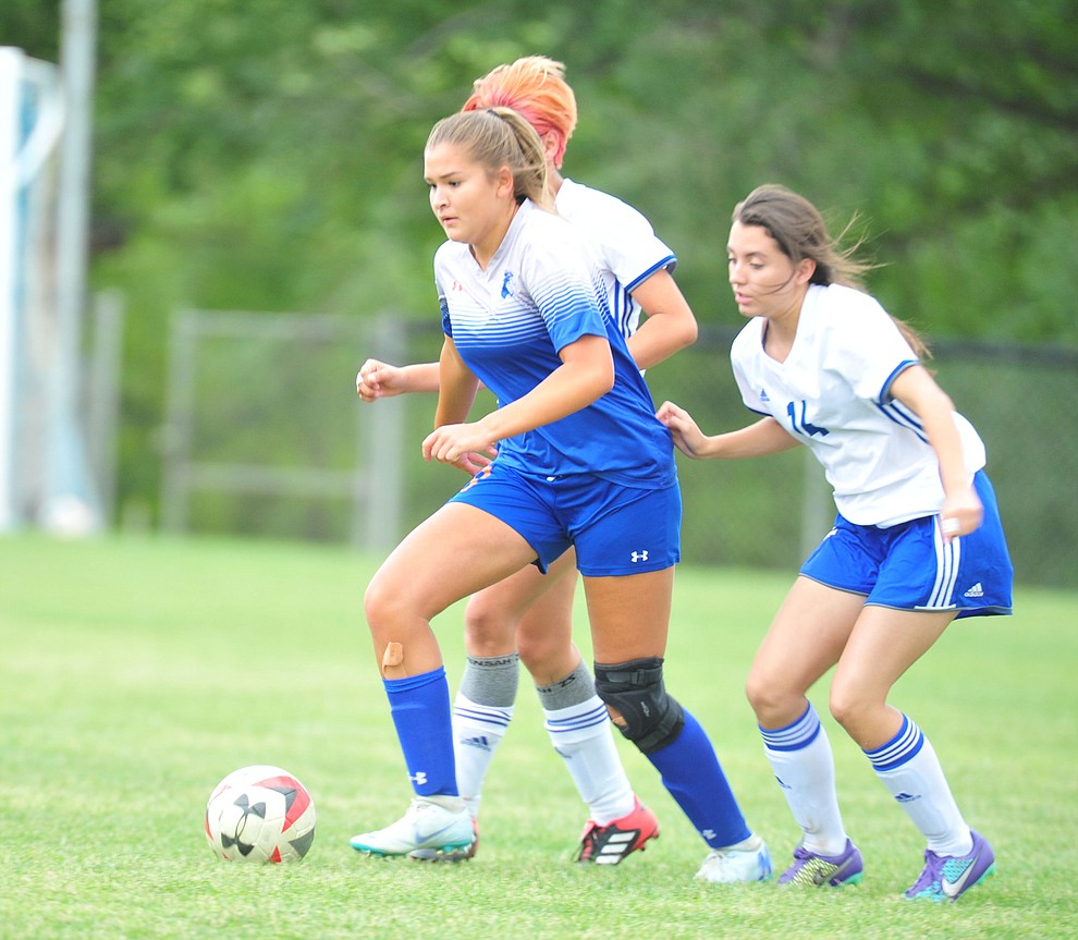 Chino Valley's Sabrina Lopez drives the ball forward as the Cougars take on Snowflake at home Tuesday Sept. 4, 2018. (Les Stukenberg/Courier)