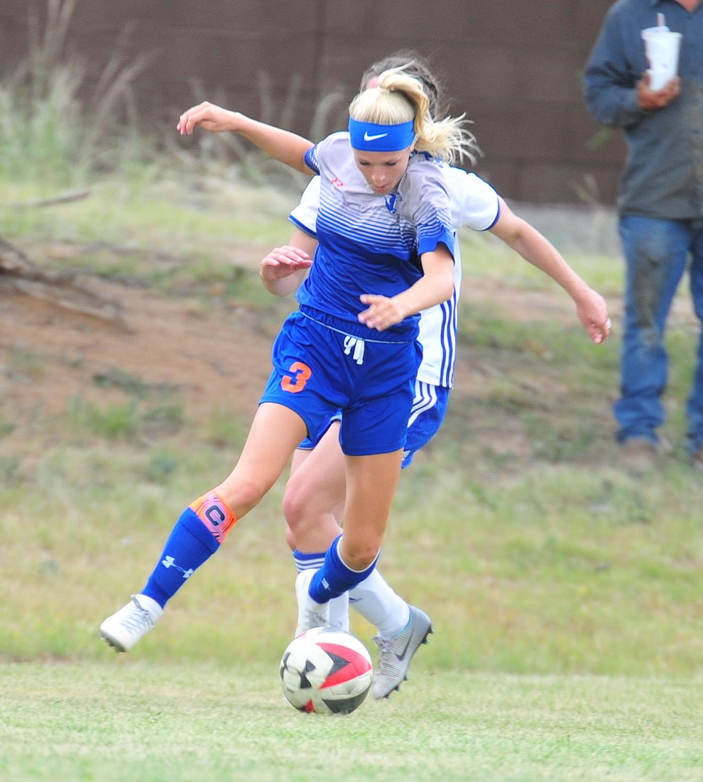 Chino Valley's Lauren Foster drives the ball as the Cougars take on Snowflake at home Tuesday Sept. 4, 2018. (Les Stukenberg/Courier)