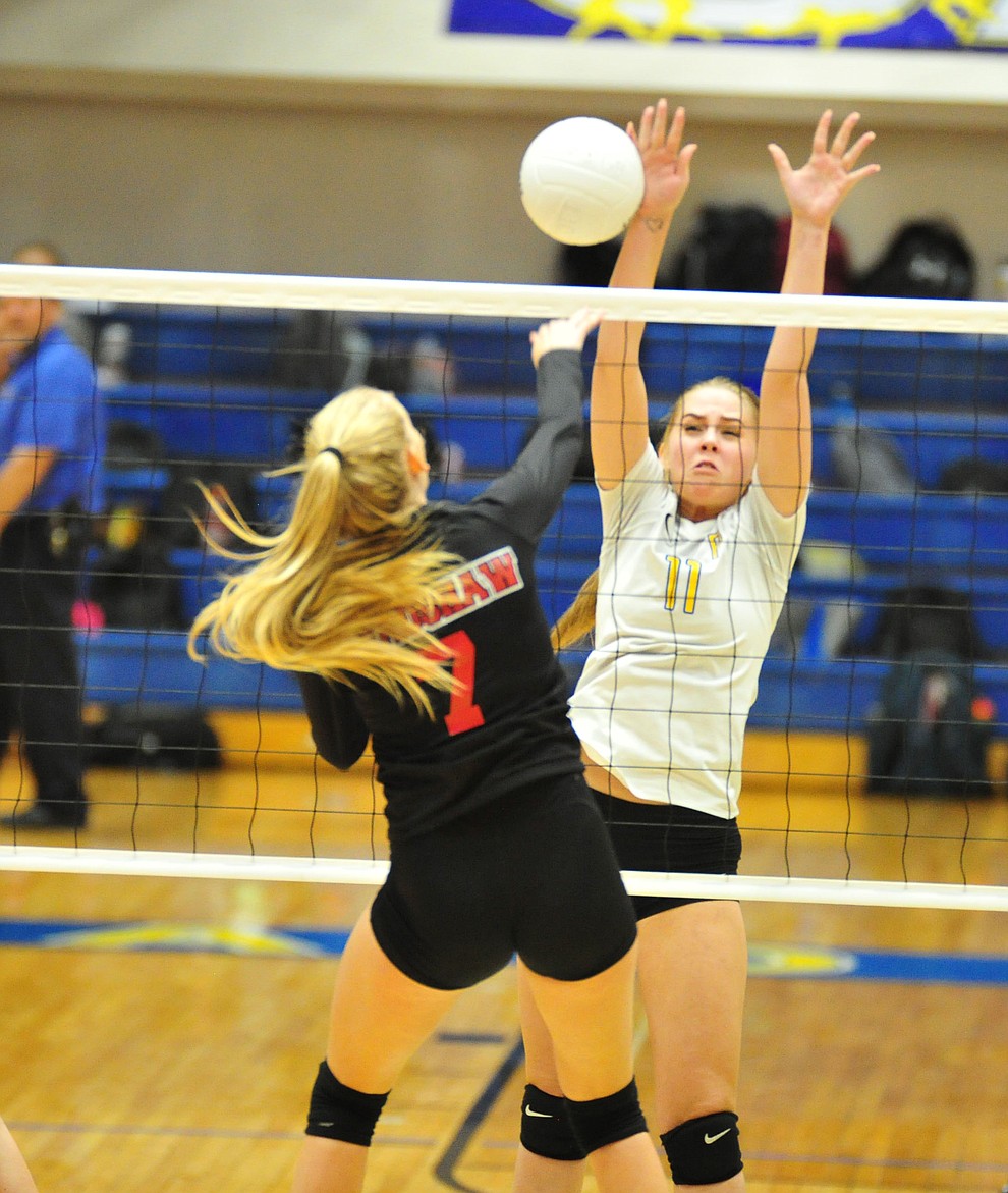 Prescott's Helen Burger goes for a block on Rylee Bundrick as the Badgers hosted Bradshaw Mountain in a cross-town volleyball matchup Thursday Sept. 6, 2018. (Les Stukenberg/Courier)