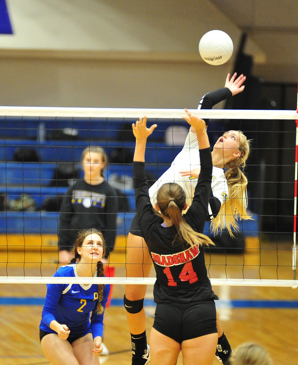 Prescott's Kathrine Radavich gets high for a kill as the Badgers hosted Bradshaw Mountain in a cross-town volleyball matchup Thursday Sept. 6, 2018. (Les Stukenberg/Courier)