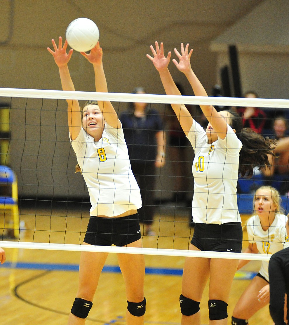 Prescott's Danielle Dreher and Meleya Resnick go for the block as the Badgers hosted Bradshaw Mountain in a cross-town volleyball matchup Thursday Sept. 6, 2018. (Les Stukenberg/Courier)