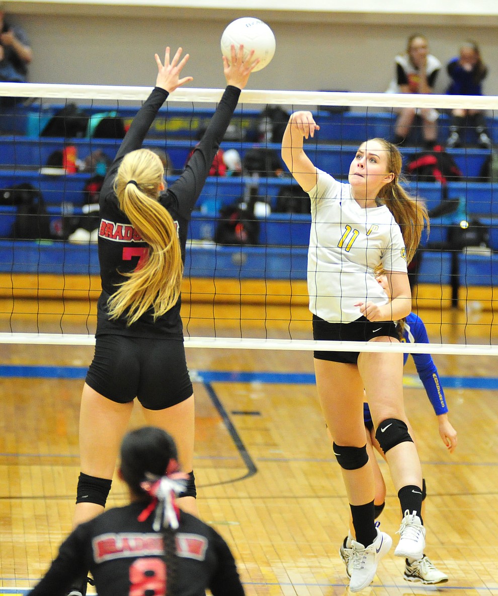 Prescott's Helen Burger tries to go over Rylee Bundrick as the Badgers hosted Bradshaw Mountain in a cross-town volleyball matchup Thursday Sept. 6, 2018. (Les Stukenberg/Courier)