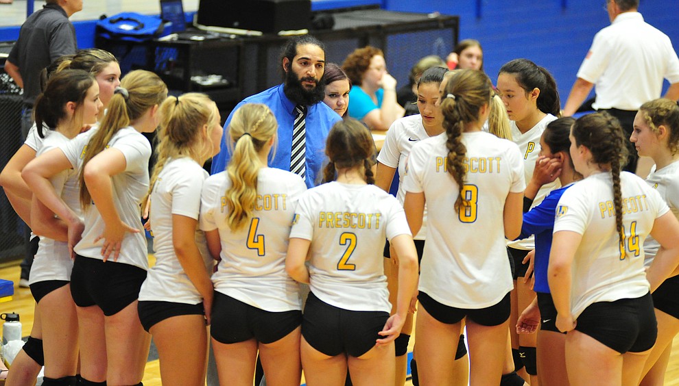 Prescott's Head Coach Josiah Ramirez encourages the players as the Badgers hosted Bradshaw Mountain in a cross-town volleyball matchup Thursday Sept. 6, 2018. (Les Stukenberg/Courier)