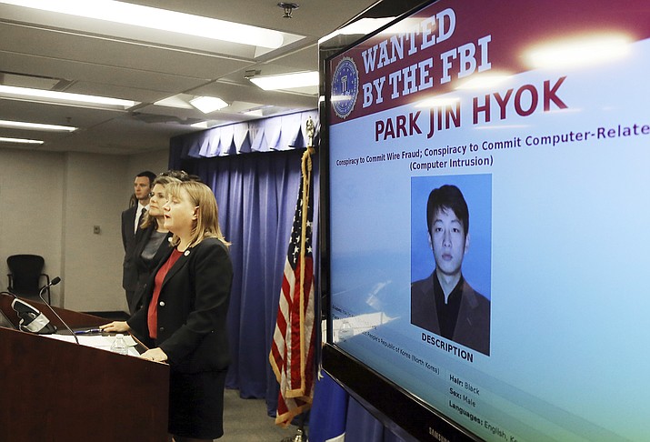 U.S. Attorney Tracy Wilkison announces a criminal complaint being filed against a North Korean national accused in a series of destructive cyberattacks around the world, at a news conference in Los Angeles Thursday, Sept. 6, 2018. The complaint alleges Park Jin Hyok, computer programmer accused of working at the behest of the North Korean government, was charged Thursday in connection with several high-profile cyberattacks, including the Sony Pictures Entertainment hack and the WannaCry ransomware virus that affected hundreds of thousands of computers worldwide. (Reed Saxon/AP Photo)