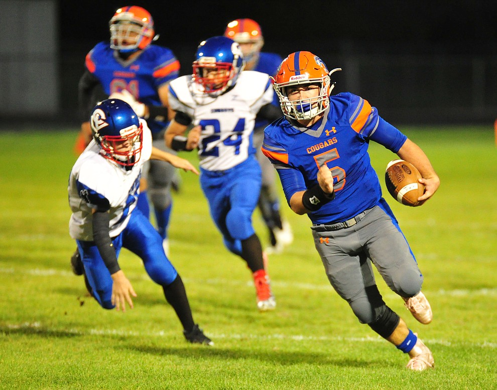 Chino Valley's Mikey Paulus runs for a touchdown as they host Camp Verde in the annual Copper Boot game Friday Sept. 7, 2018 in Chino Valley. (Les Stukenberg/Courier)