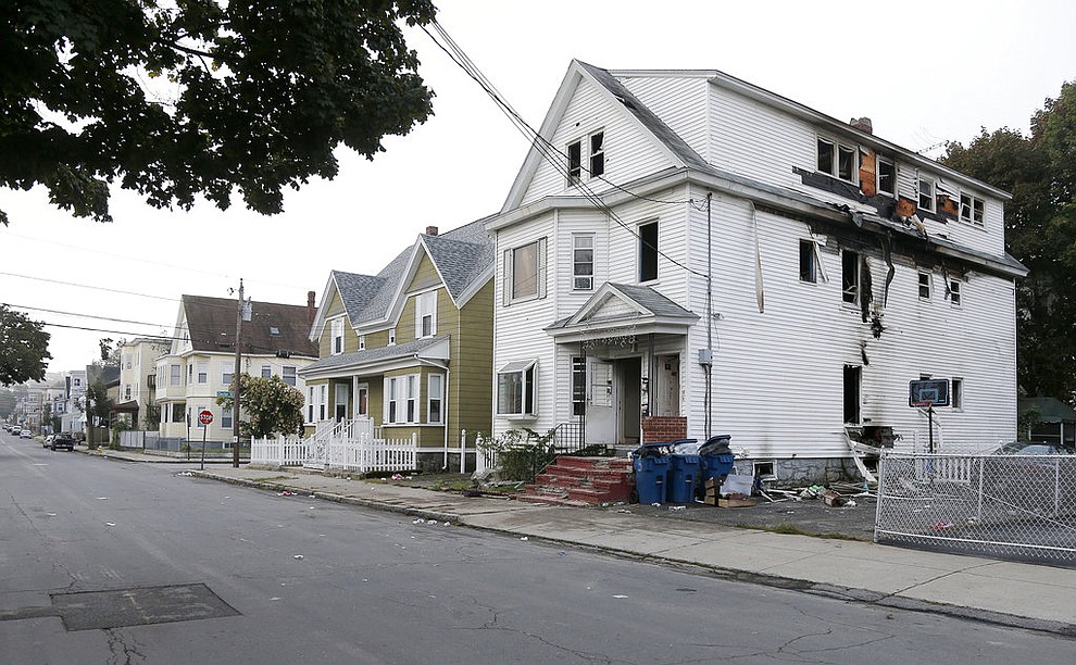 A damaged house on Bowdoin Street in Lawrence Mass., is seen Friday, Sept. 14, 2018. The home was one of multiple houses that went up in flames on Thursday afternoon after gas explosions and fires triggered by a problem with a gas line that feeds homes in several communities north of Boston (AP Photo/Mary Schwalm)