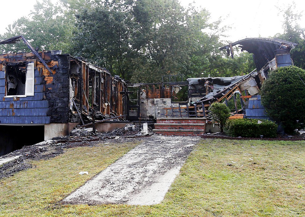 A damaged house on Jefferson Street, in Lawrence, Mass., is seen Friday, Sept. 14, 2018. The home was one of multiple houses that went up in flames on Thursday afternoon after gas explosions and fires triggered by a problem with a gas line that feeds homes in several communities north of Boston (AP Photo/Mary Schwalm)