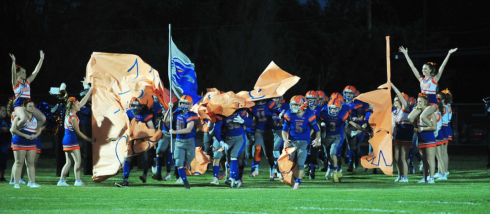 Chino Valley's football team takes the field as the Cougars host Arizona College Prep Friday, Sept. 14, 2018. (Les Stukenberg/Courier)