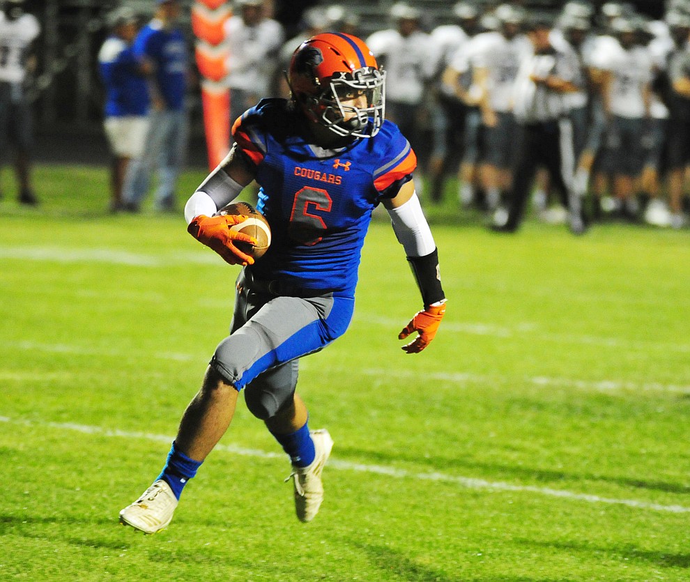 Chino Valley's Elijah Scordato score a touchdown as the Cougars host Arizona College Prep Friday, Sept. 14, 2018. (Les Stukenberg/Courier)