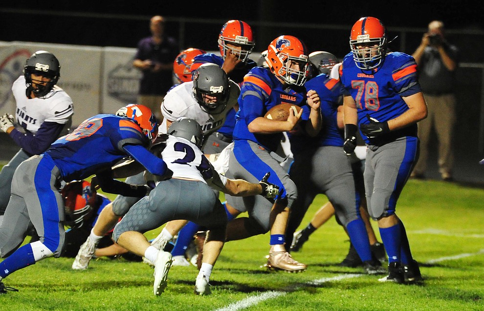 Chino Valley's Mikey Paulus score the second touchdown of the night as the Cougars host Arizona College Prep Friday, Sept. 14, 2018. (Les Stukenberg/Courier)